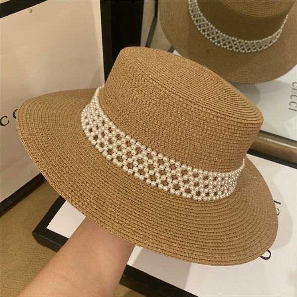 Chapeau style borsalino en fibre naturelle orné de perles - Élégance sophistiquée.