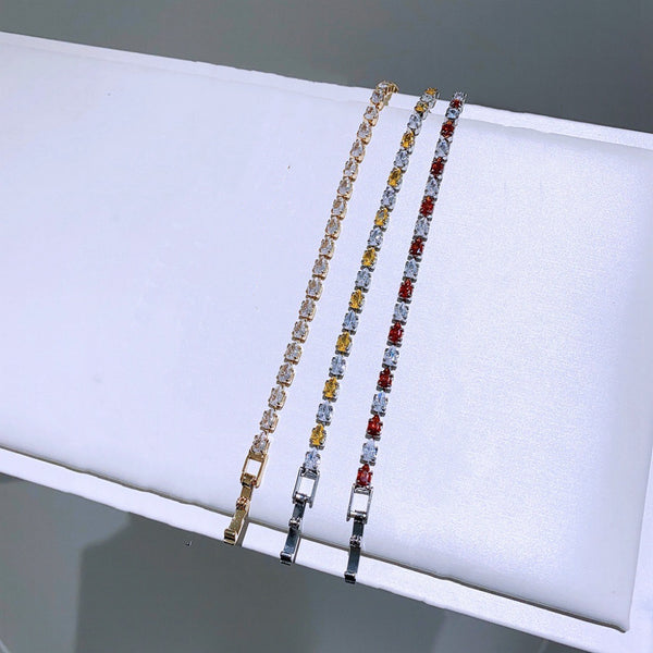 Ensemble de trois bracelets en forme de goutte rouge et jaune