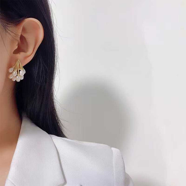 Boucle d'oreille perle d'eau douce en argent 925