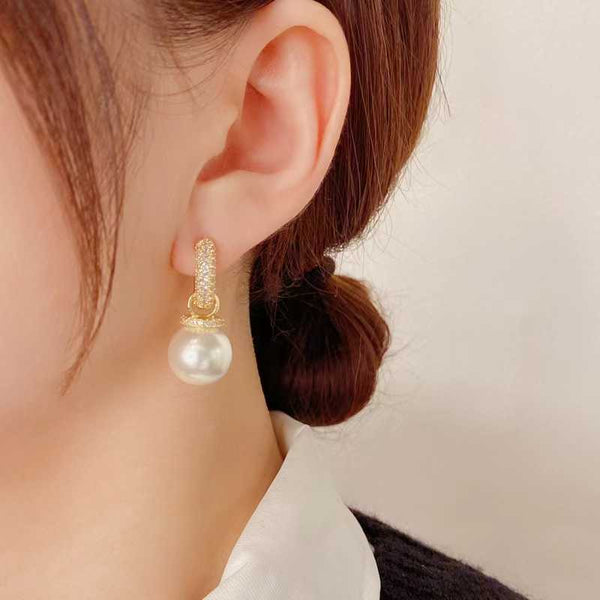 Boucle d'oreille en perles brillantes