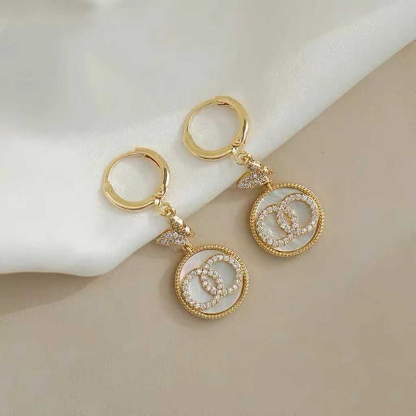 Boucle d'oreille papillon en nacre
