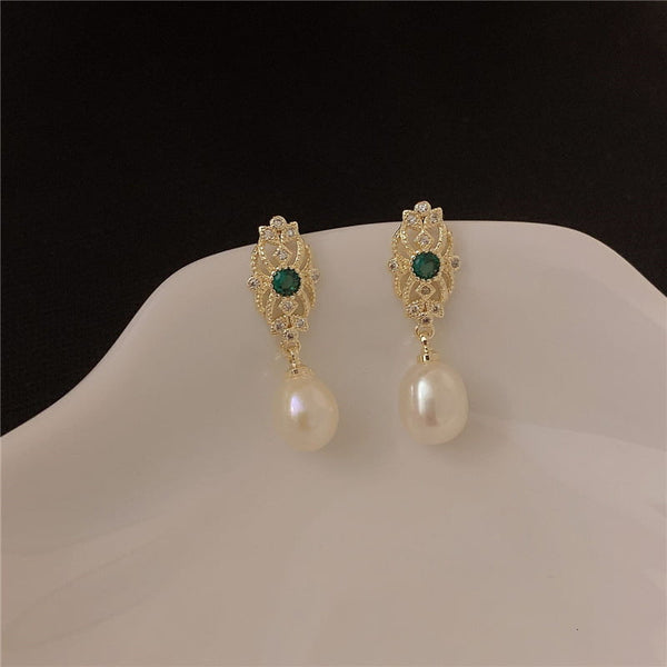 Boucle d'oreille Perle avec en zircon vert