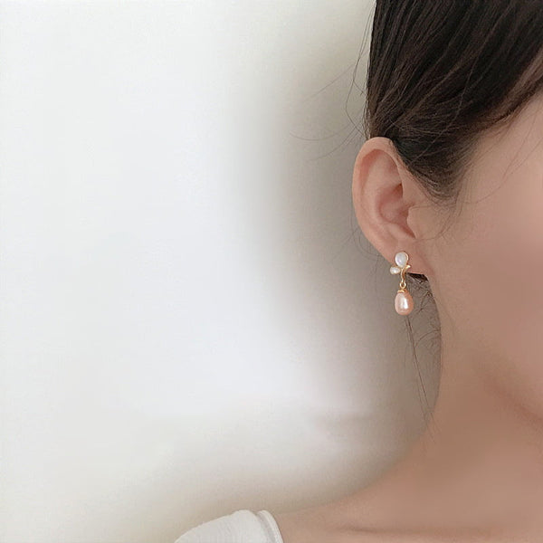 Boucle d'oreille papillon perle d'eau douce rose