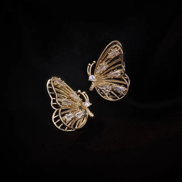 Clous d'oreilles papillon scintillants en argent 925