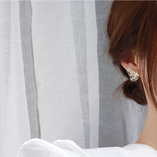 Clous d'oreilles papillon scintillants en argent 925