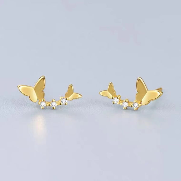 Clous d'oreilles papillon dansant en argent