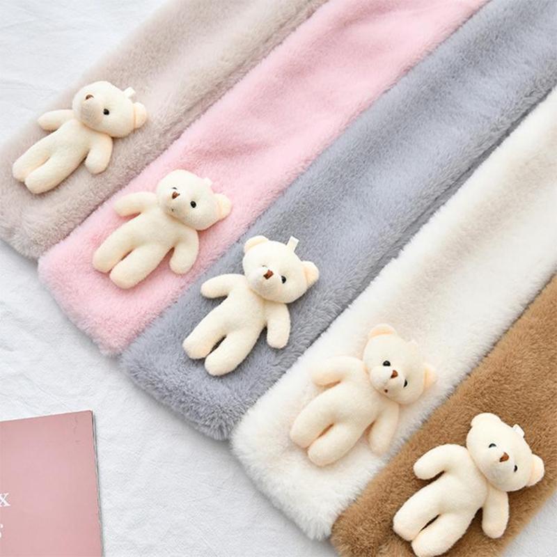 Écharpe douce comme un ourson câlin.
