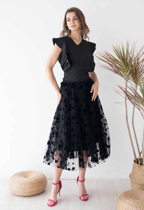 Jupe mi-longue en maille double couche avec motif posy en 3D