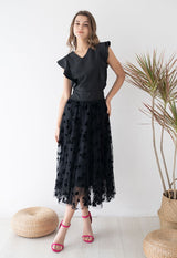 Jupe mi-longue en maille double couche avec motif posy en 3D