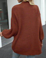 Cardigan caramel à manches lanternes.