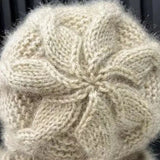Tout-en-un: Bonnet + écharpe.