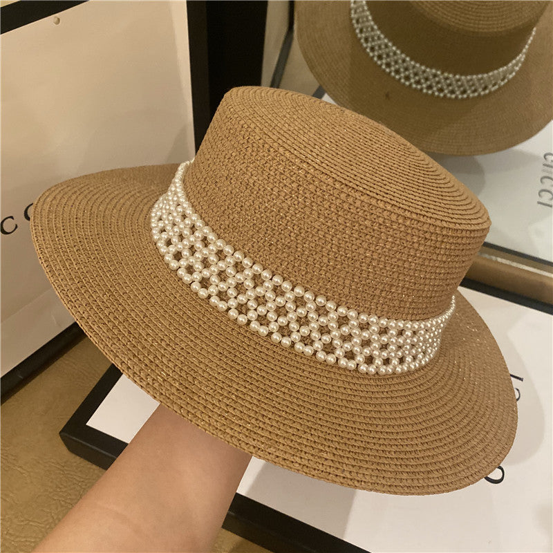Chapeau style borsalino en fibre naturelle orné de perles - Élégance sophistiquée.