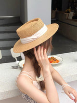 Chapeau style borsalino en fibre naturelle avec ruban noué - Charme estival.
