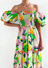 Robe longue à imprimé tropical et épaules dénudées