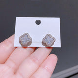 Ensemble de 4 paires de clous et créoles serties de zircons super brillants