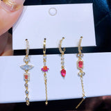 Ensemble de 4 paires de boucles d'oreilles pendantes en zircons roses