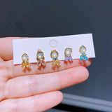 Ensemble de 5 paires de boucles d'oreilles univers magique