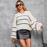Pull en tricot texturé avec épaules descendantes