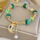 Bracelet pendentif avec une pierre d'œil de tigre verte