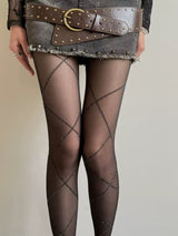 Lot de quatre collants clair ornés d’un délicat motif