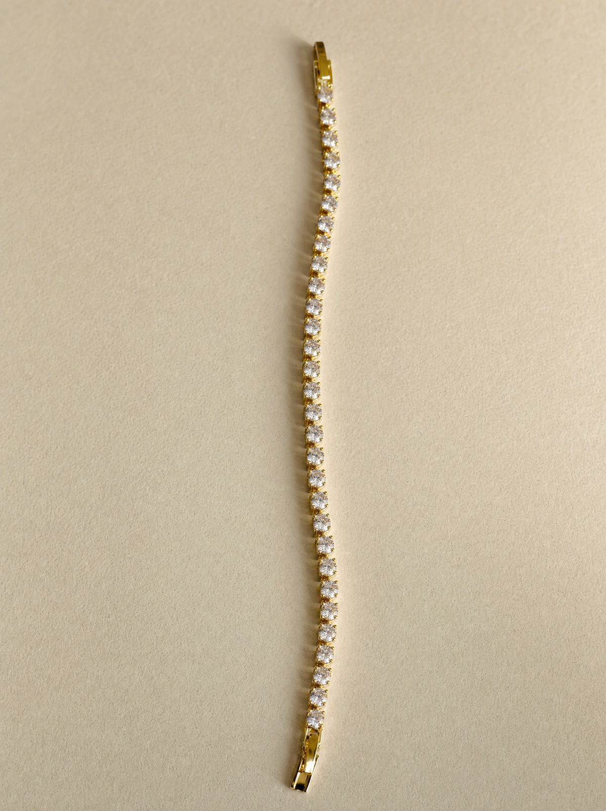 Bracelet tennis doré grands zircons