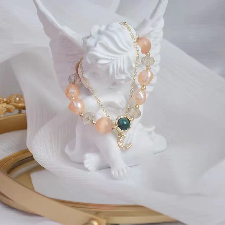 Bracelet réglable en perles d'eau douce et oeil de chat