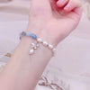 Bracelet fleur de zircon aigue-marine perle d'eau douce