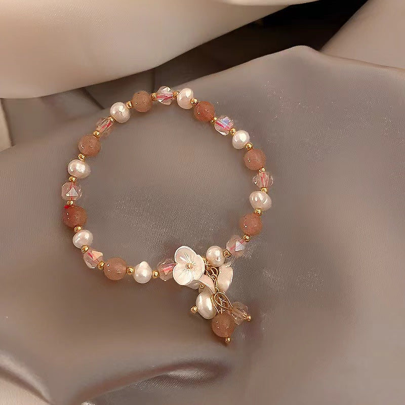 Bracelet de fleur de papillon de quartz de perle rose