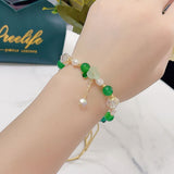 Bracelet Fleur de perle d'eau douce et pierre de jade 