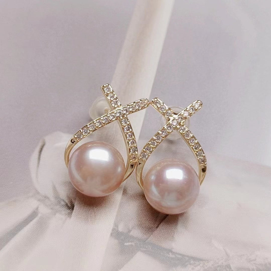 Boucle d'oreille perle d'eau douce X