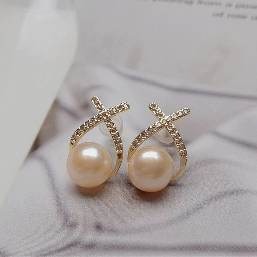 Boucle d'oreille perle d'eau douce X