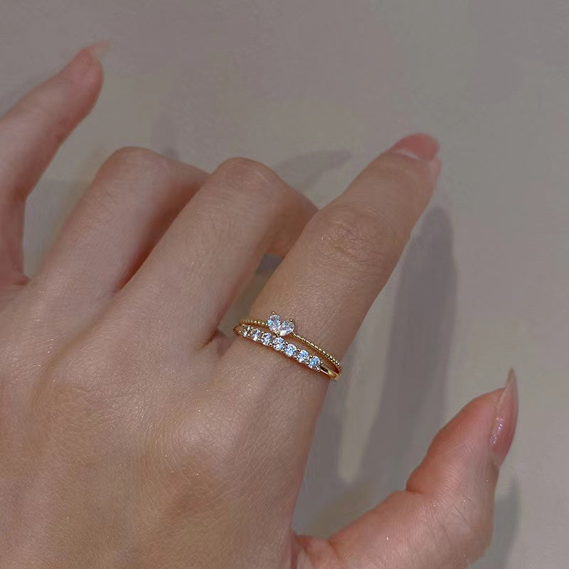 Lot de 3 bagues en zircon carré et cœur.