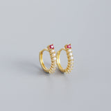 Boucles d'oreilles créoles en argent 925 clair avec zircon fuchsia