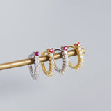 Boucles d'oreilles créoles en argent 925 clair avec zircon fuchsia