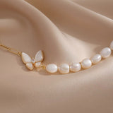 Ensemble papillons en perle naturelle