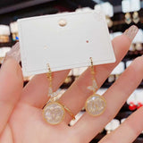Boucle d'oreille papillon en nacre