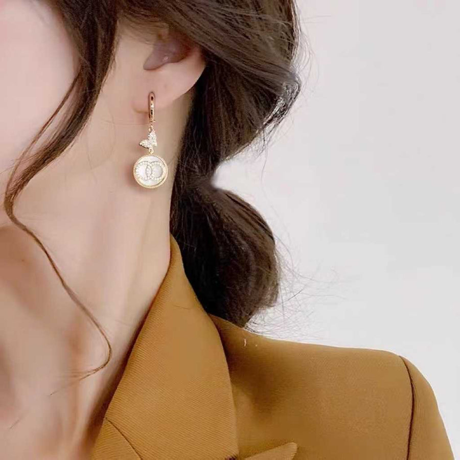 Boucle d'oreille papillon en nacre