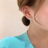 Boucle d'oreille cygne en zircone