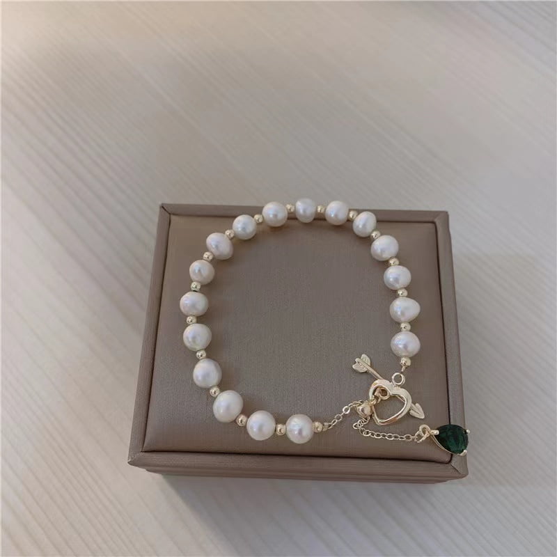 Bracelet en perles naturelles et cœur – photo 5