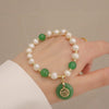 Bracelet de perles de culture blanche et pierres de jade