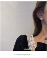 Boucles d’oreilles marguerites en perles d'eau douce