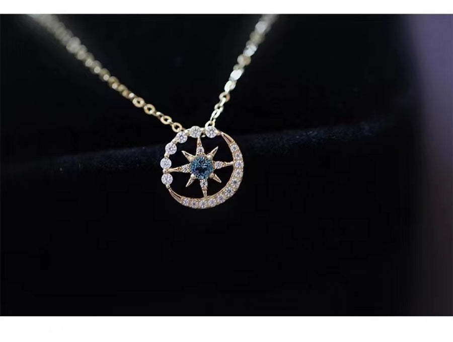 Collier en argent avec lune et étoile en zircon bleu
