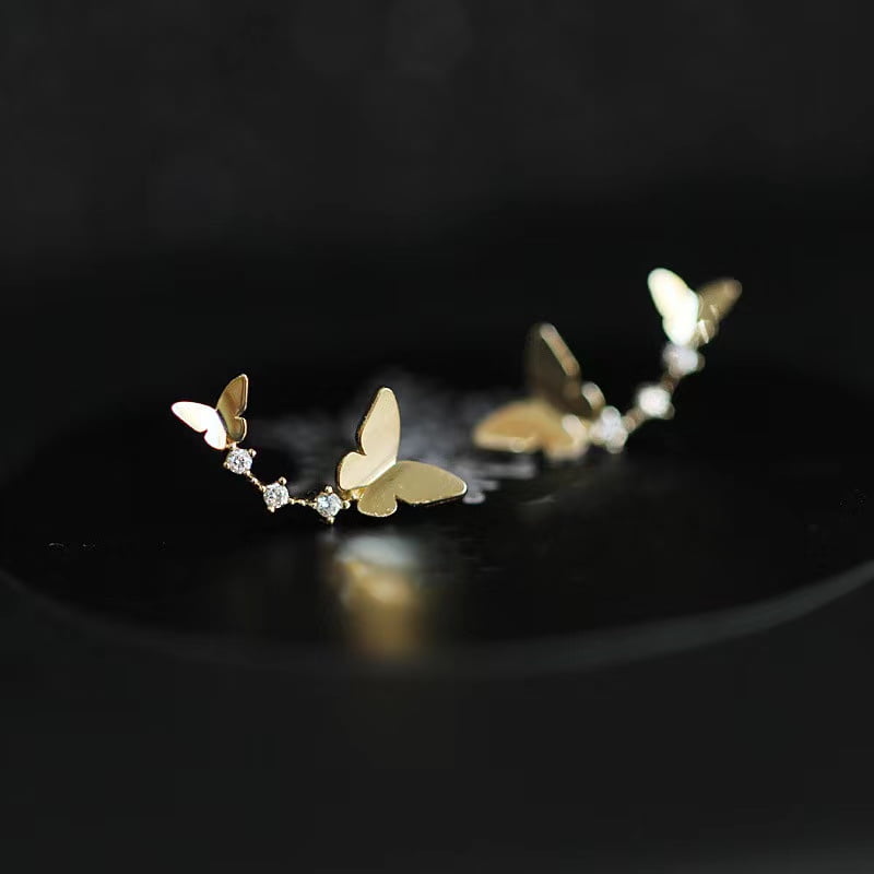 Clous d'oreilles papillon dansant en argent 