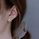 Clous d'oreilles papillon dansant en argent 