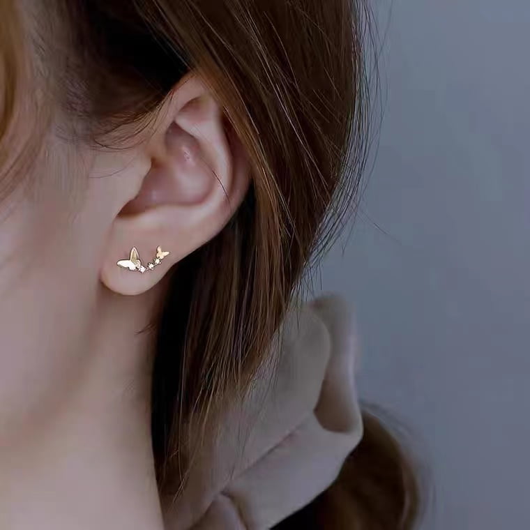 Clous d'oreilles papillon dansant en argent 