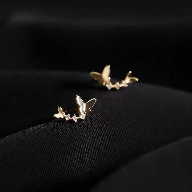Clous d'oreilles papillon dansant en argent 