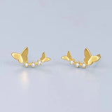 Clous d'oreilles papillon dansant en argent 
