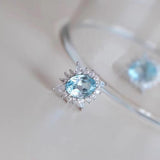 Boucles d'oreilles en argent 925 et topaze bleu ciel pâle