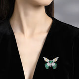 Broche papillon en zircon vert