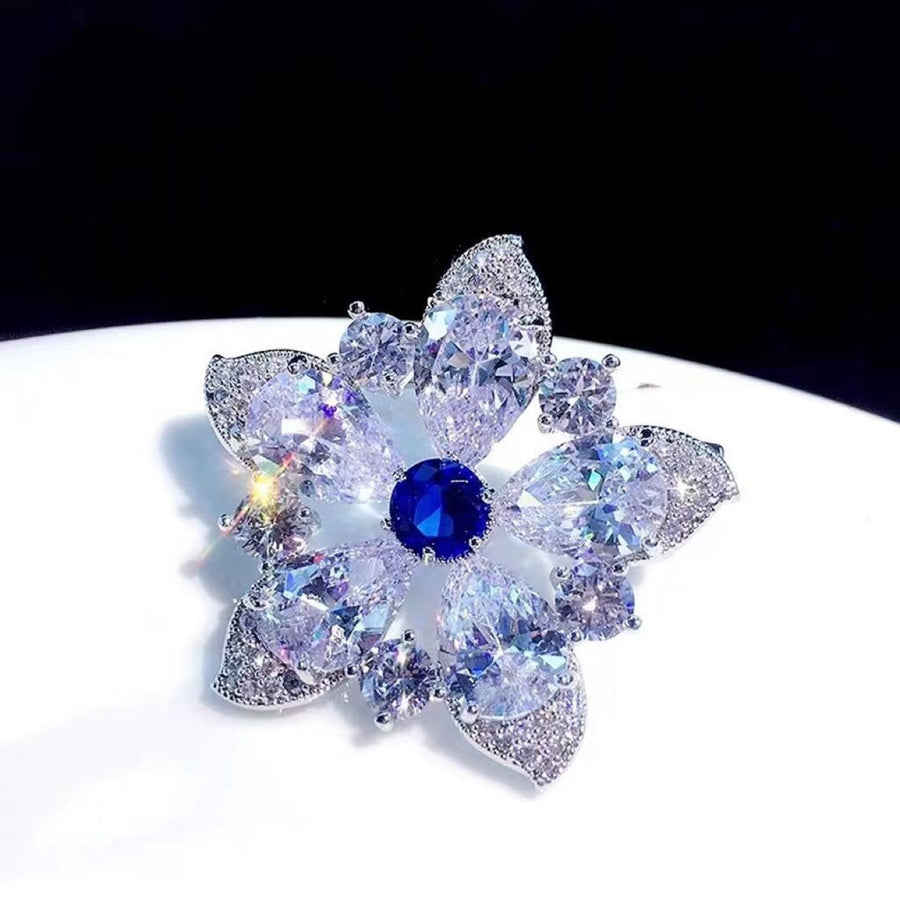 Broche fleur en saphir brillant